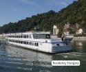Enjoy an exquisite dining experience aboard a boat, enhanced by the soothing melodies of live piano music